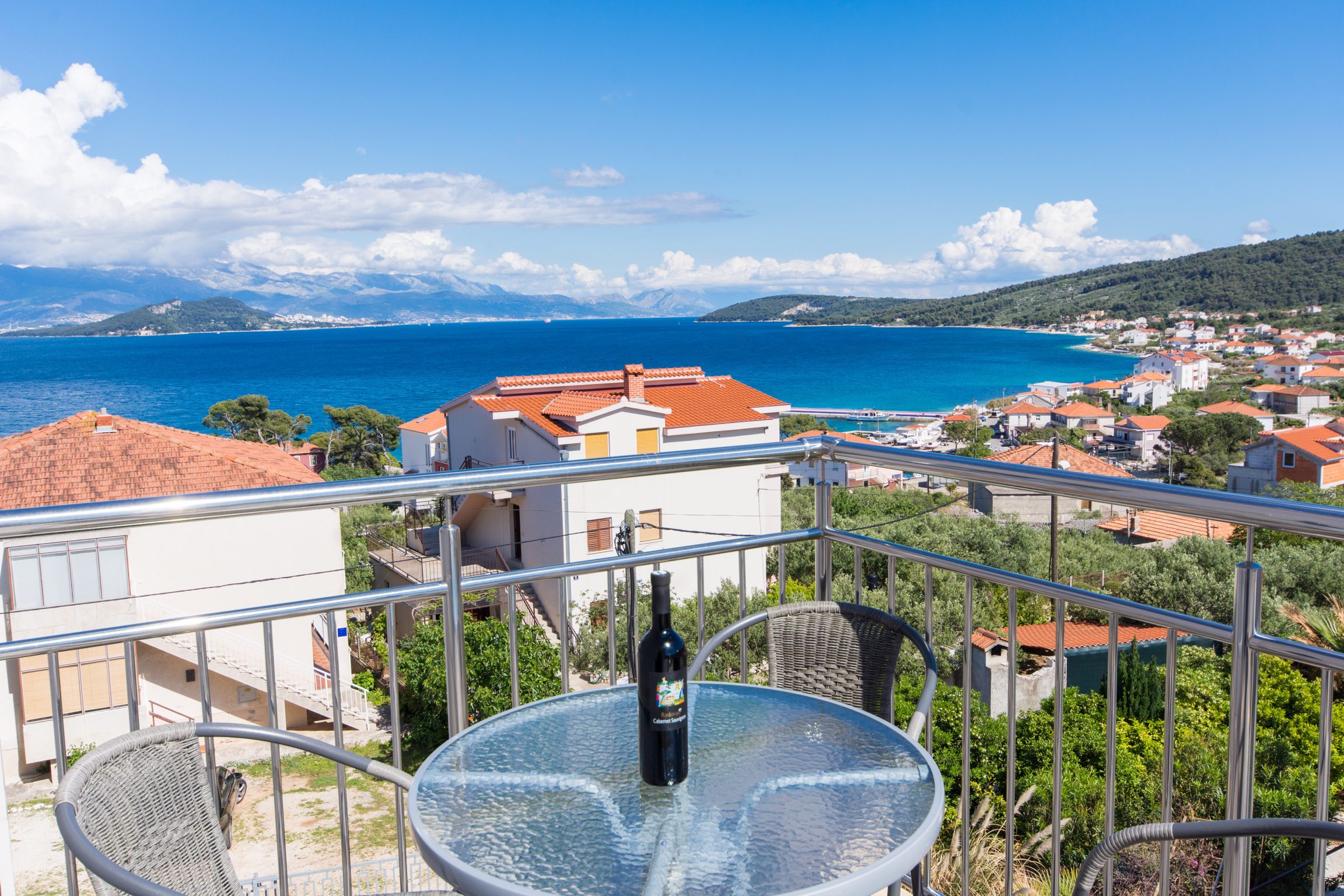 Apartment Lavender — rooftop terrace at dusk with Split in the distance