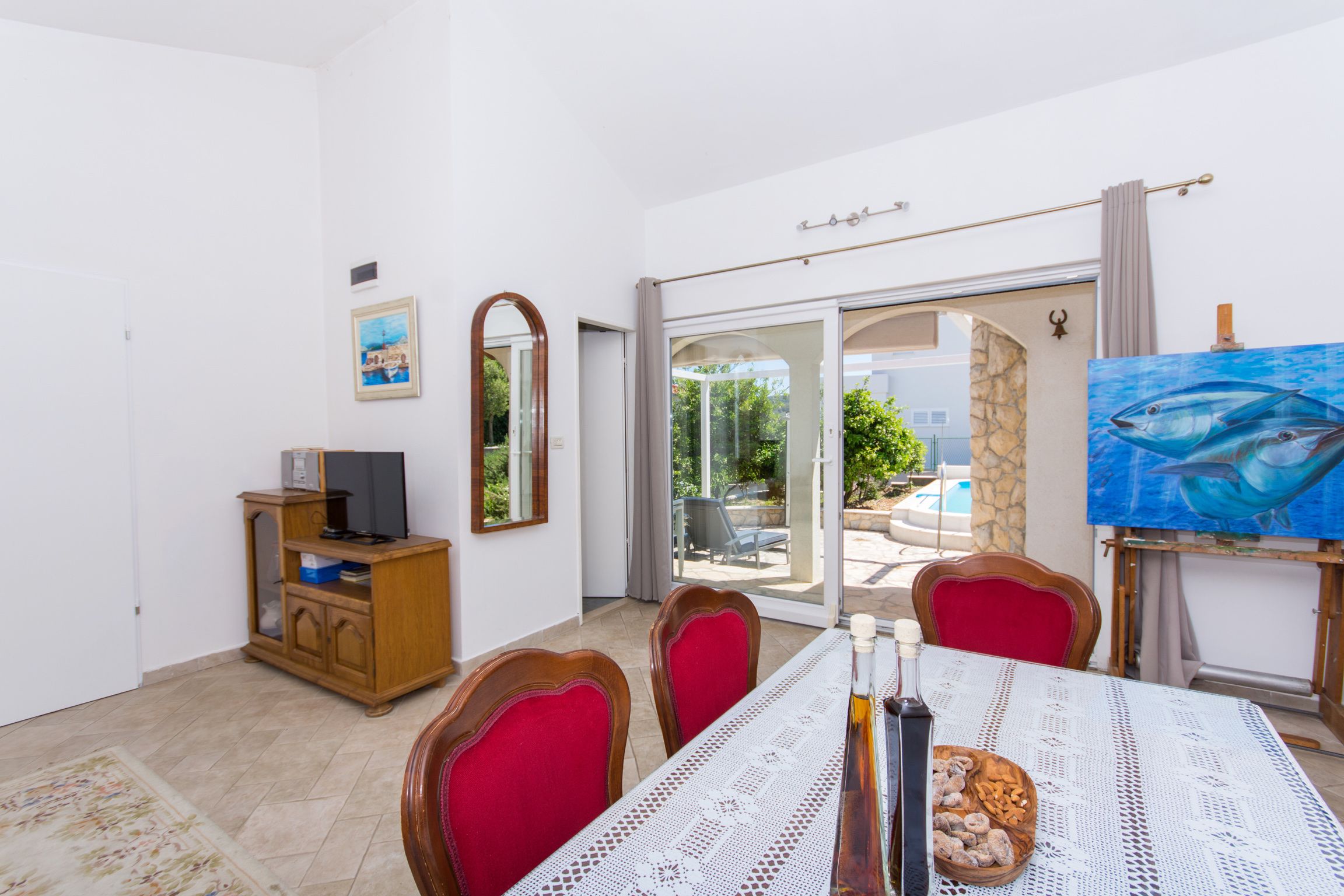 Pool House living room with stone walls