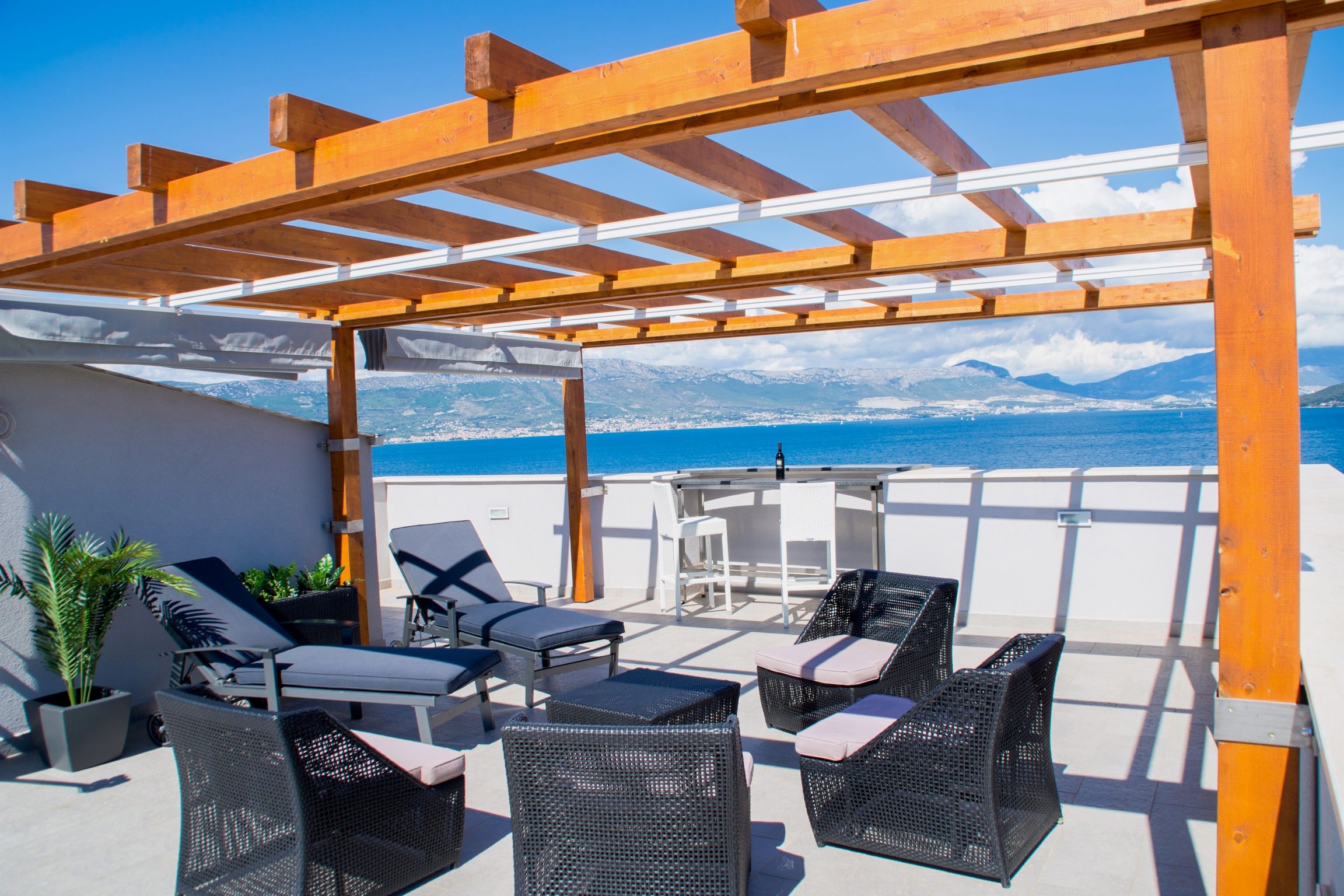 Apartment Lavender rooftop pergola with lounge seating and Adriatic sea view