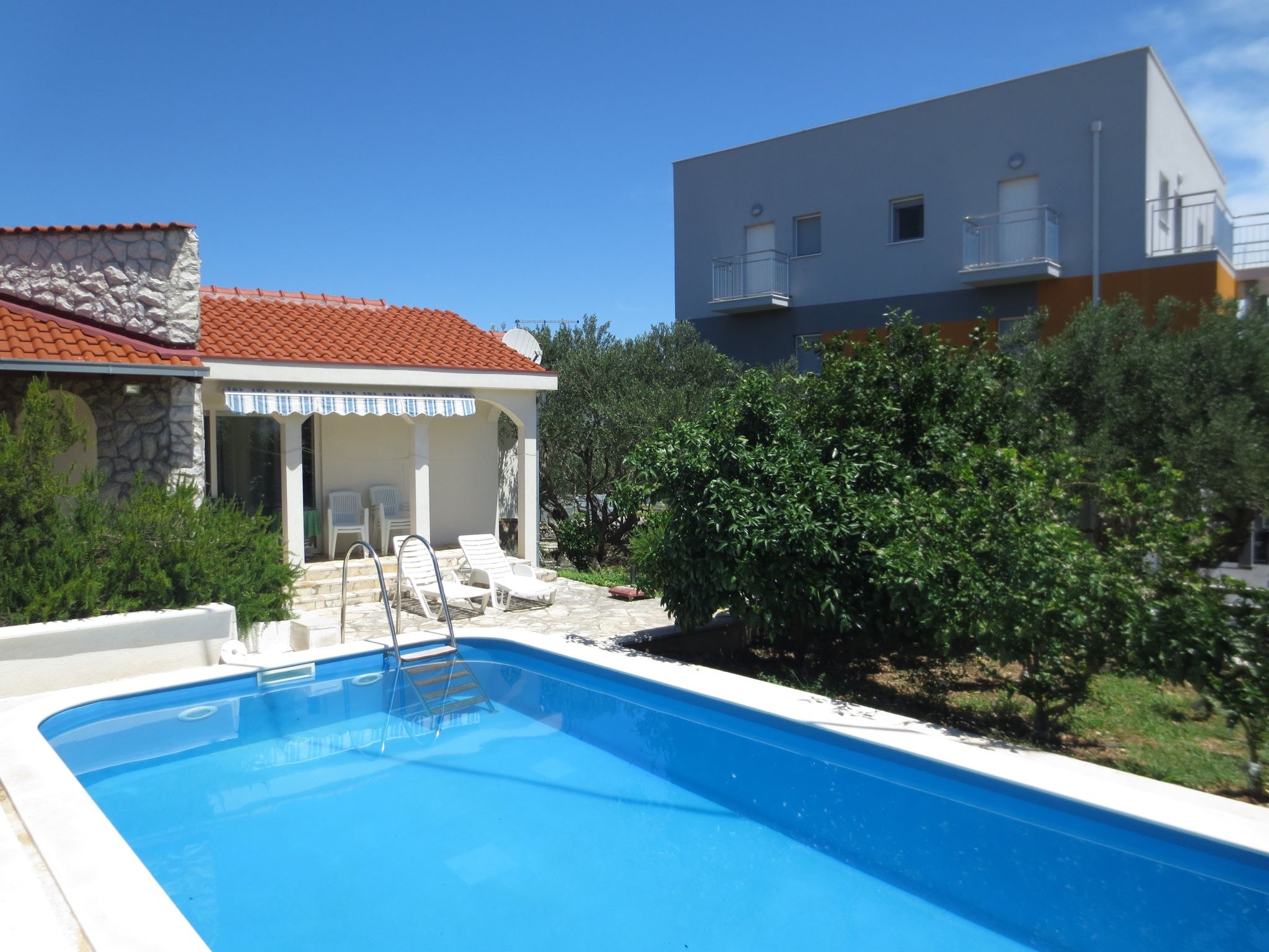 Pool House with private swimming pool, stone walls and terracotta roof on Čiovo